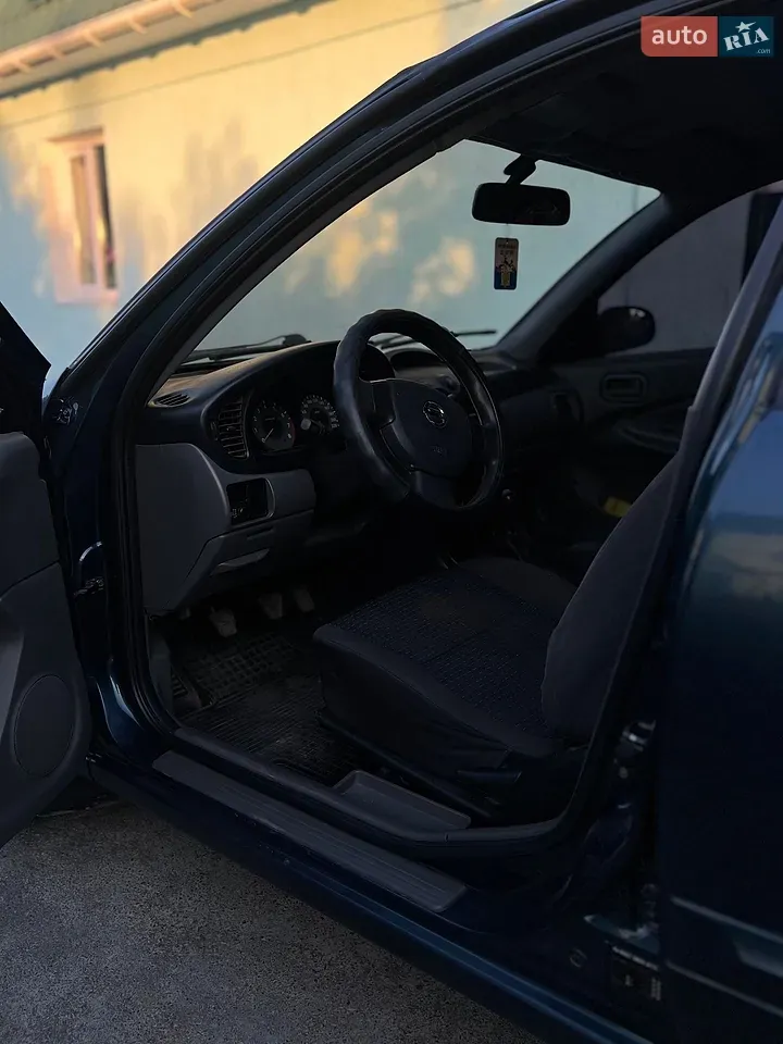 Nissan Almera 2008 photo 5