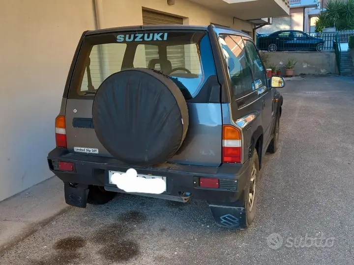 Suzuki Vitara 1997 photo 2