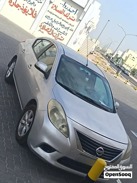 Nissan Sunny 2012 photo 4