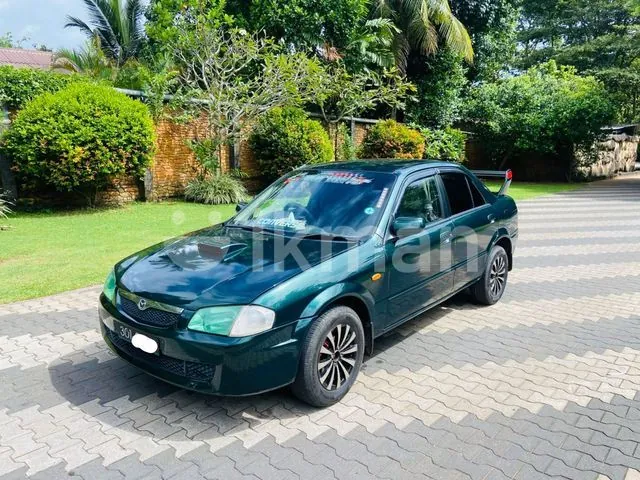 Mazda Familia 1999 photo 2