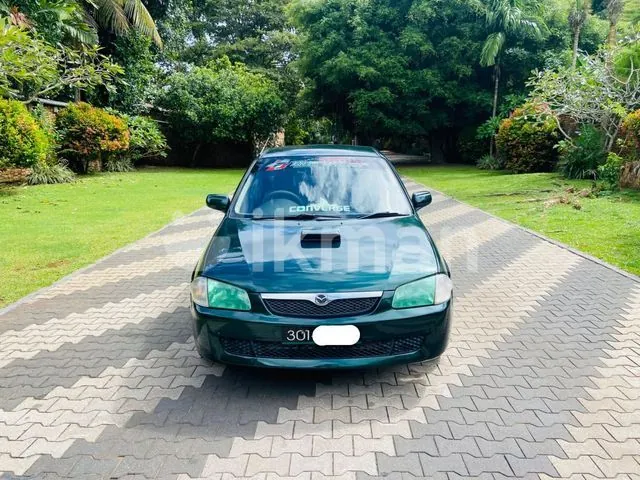 Mazda Familia 1999 photo 3