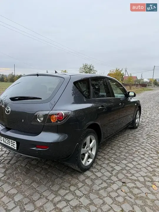 Mazda 3 2006 photo 4