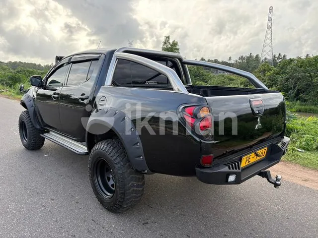 Mitsubishi L200 2007 photo 3