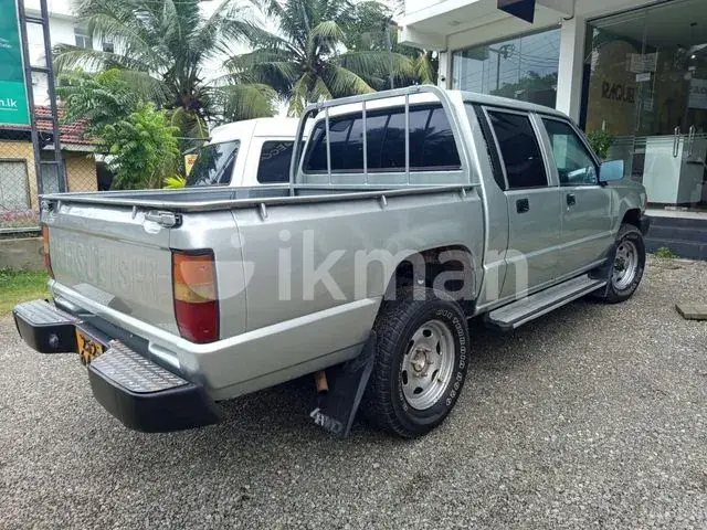 Mitsubishi L200 1998 photo 2