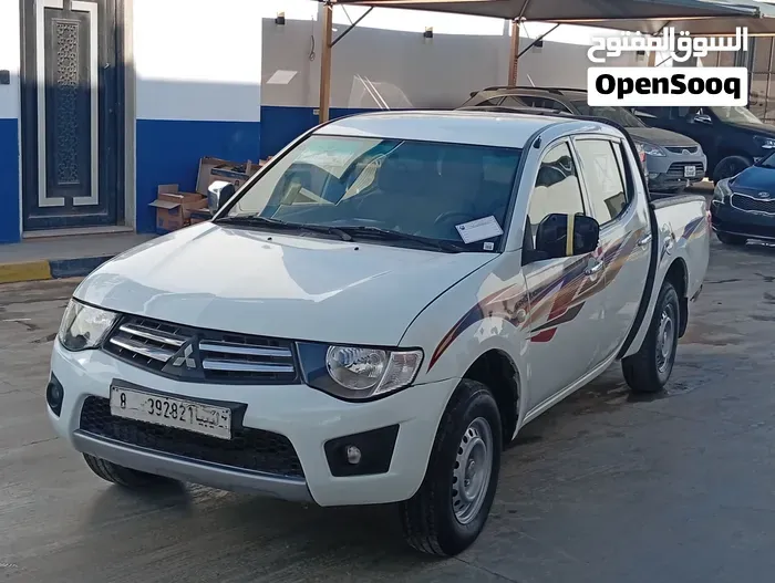 Mitsubishi L200 2014 photo 3