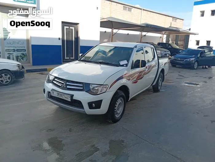 Mitsubishi L200 2014 photo 4