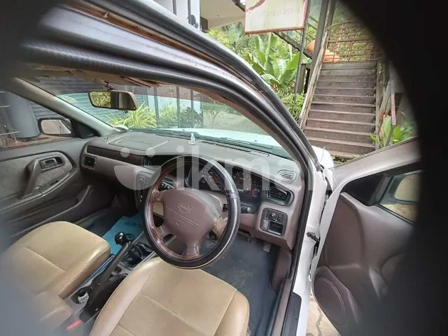 Nissan Bluebird 1999 photo 3