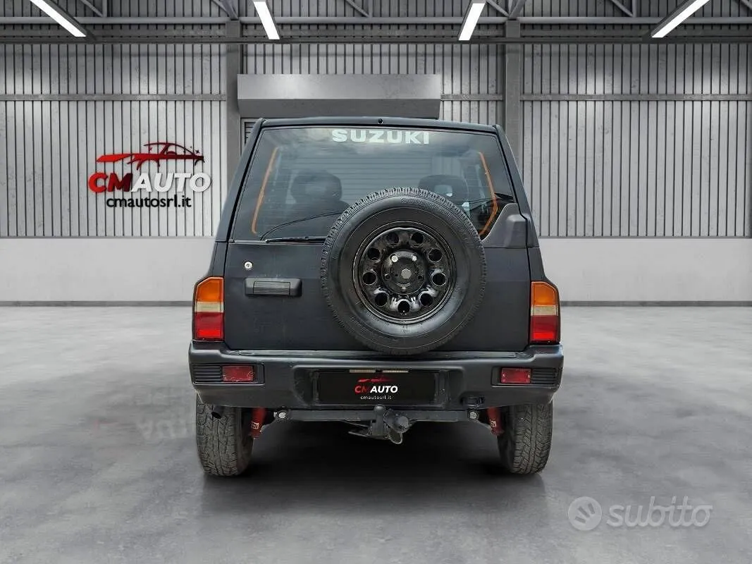 Suzuki Vitara 1997 photo 4
