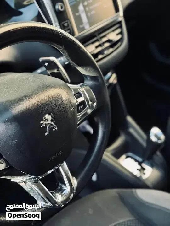 Peugeot 208 2013 photo 4