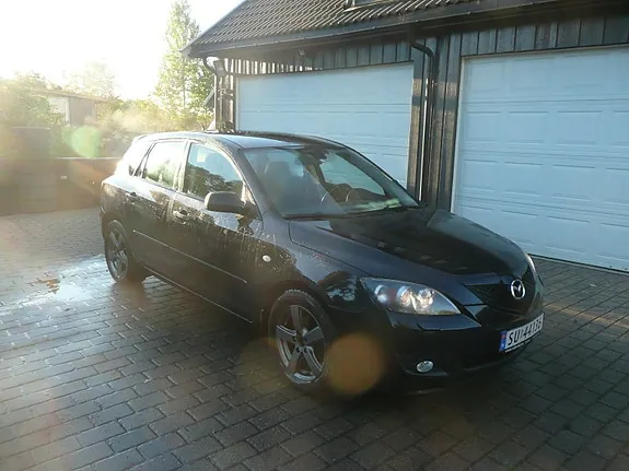 Mazda 3 2007 photo 4