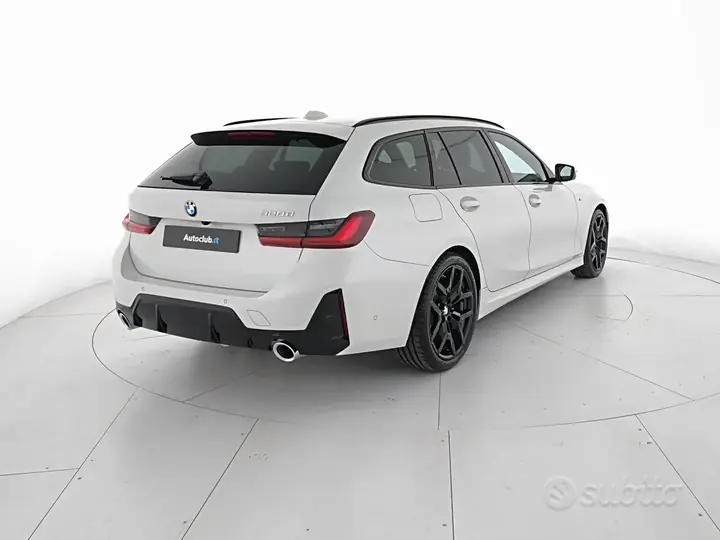 BMW 3 Series photo 2