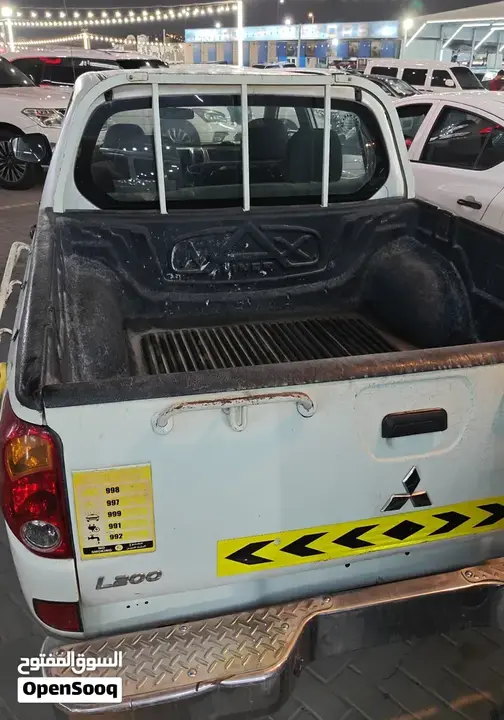 Mitsubishi L200 2013 photo 4