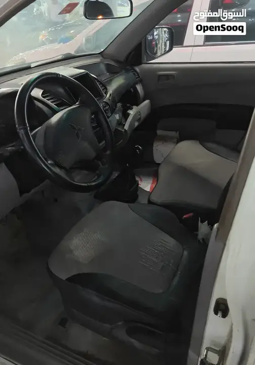 Mitsubishi L200 2013 photo 3