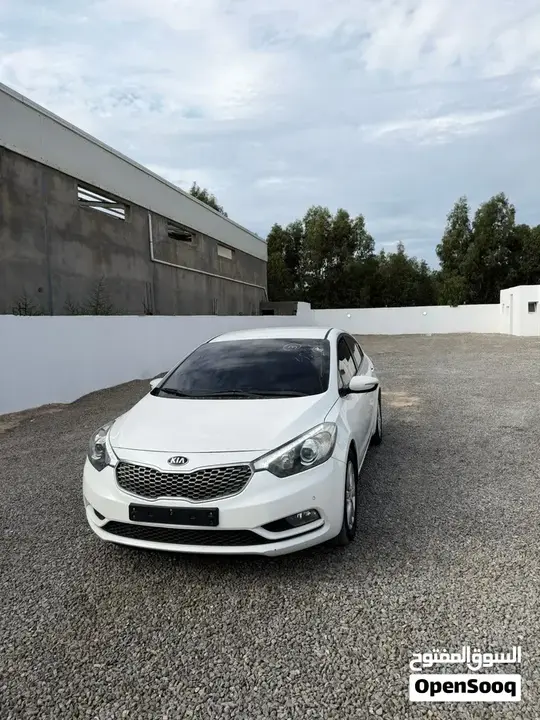 Kia K3 2013 photo 4