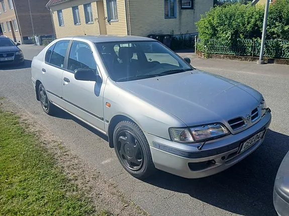 Nissan Primera 1998 photo 3