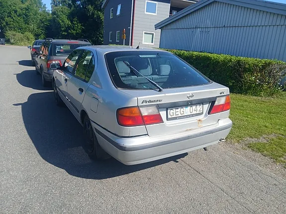 Nissan Primera 1998 photo 2