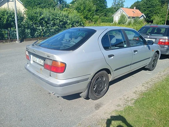 Nissan Primera 1998 photo 4