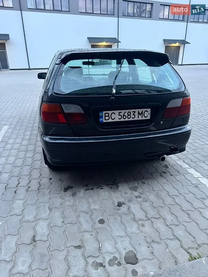 Nissan Almera 1996 photo 5