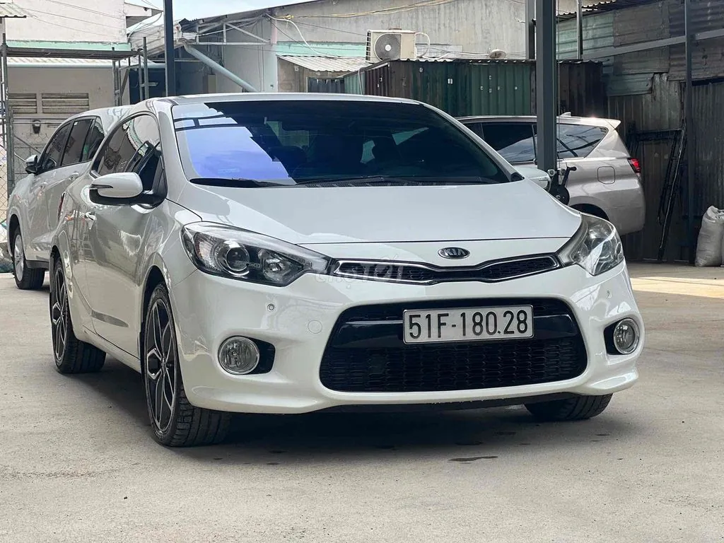 Kia Cerato Koup 2014 photo 2