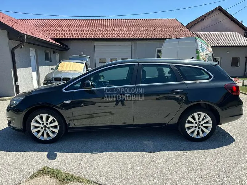 Opel Astra J 2014 photo 4
