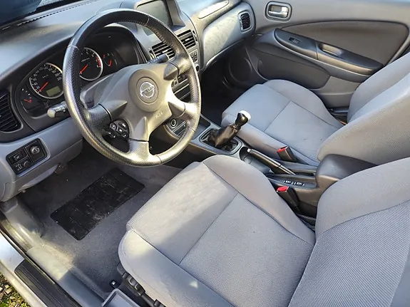 Nissan Almera 2004 photo 4