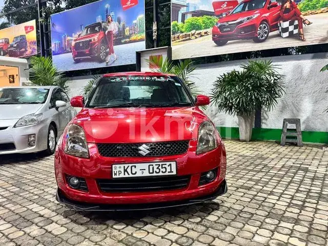 Suzuki Swift 2004 photo 2