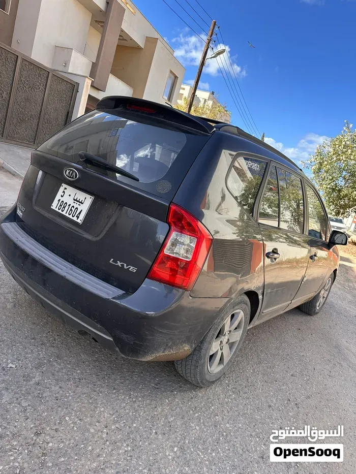 Kia Rondo 2009 photo 4