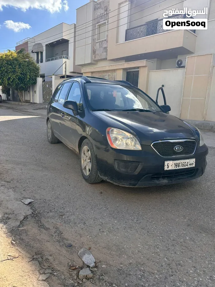 Kia Rondo 2009 photo 2