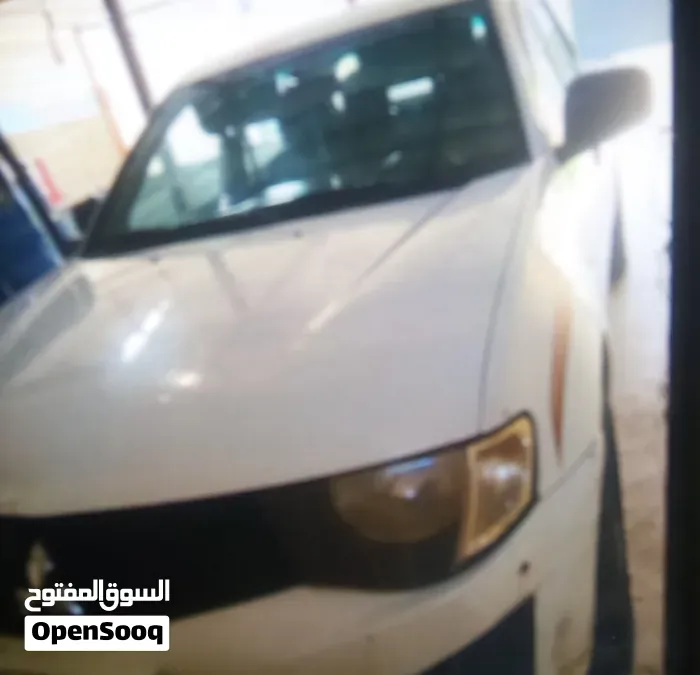 Mitsubishi L200 2010 photo 5