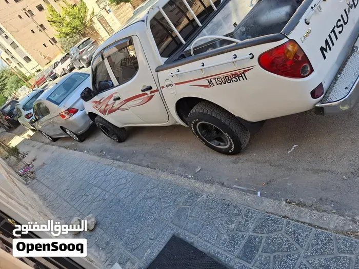 Mitsubishi L200 2008 photo 3