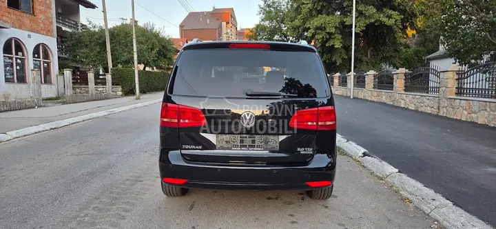 Volkswagen Touran 2012 photo 4