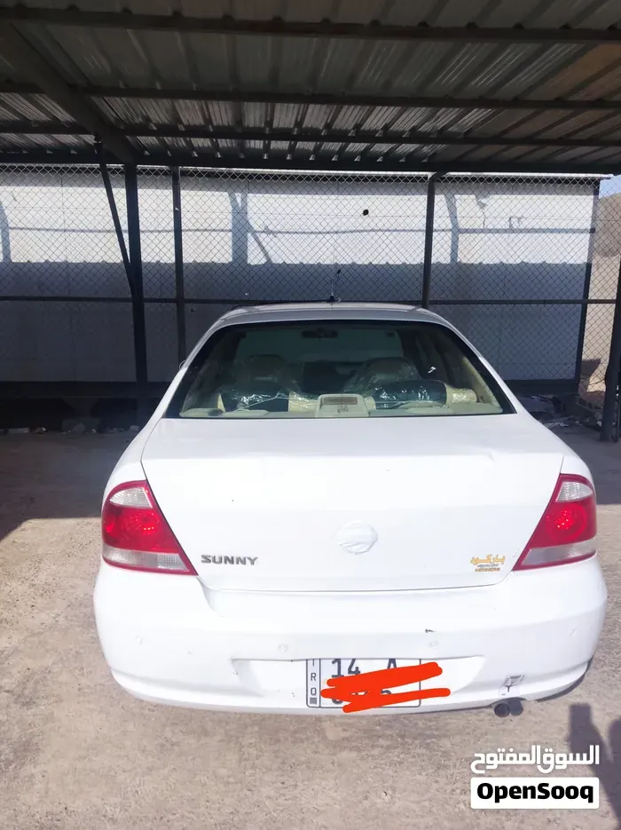 Nissan Sunny 2009 photo 4