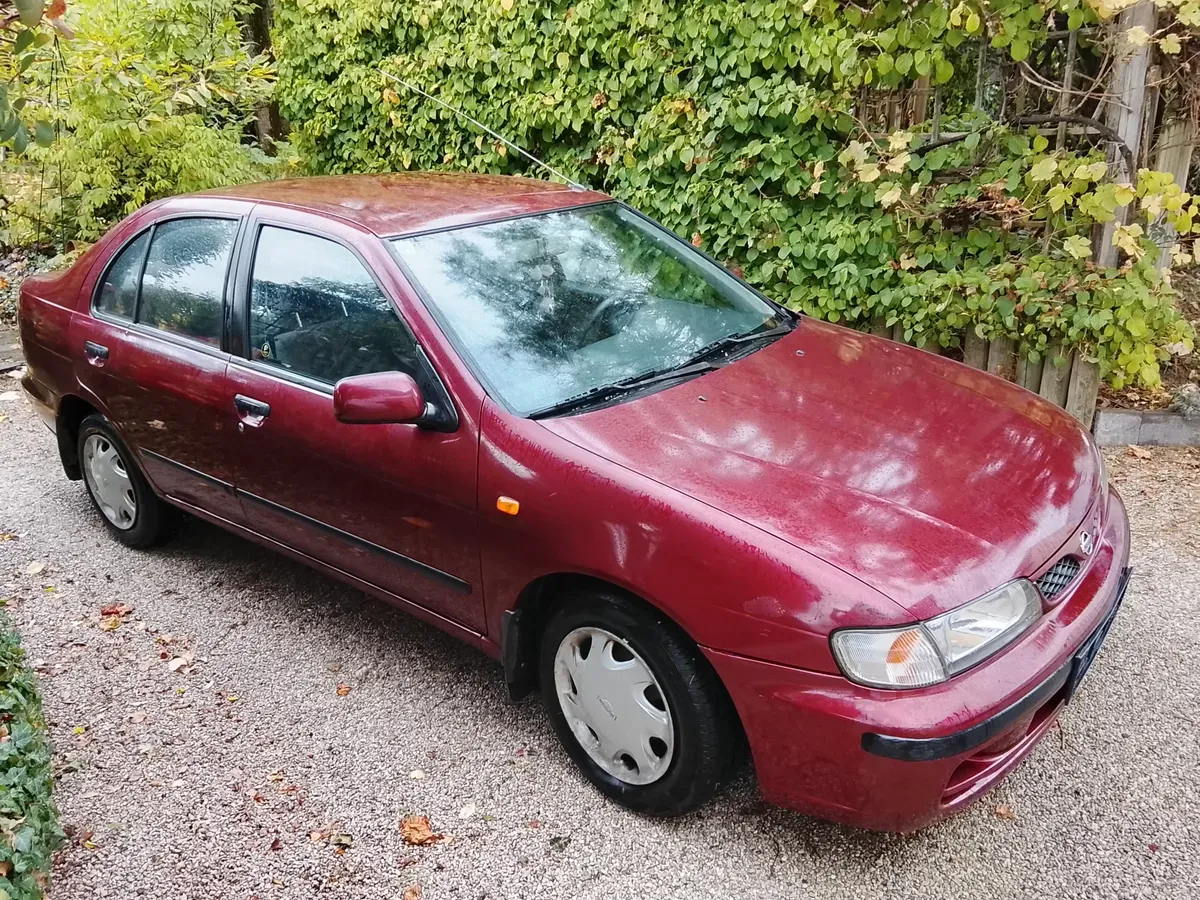Nissan Almera 2000 photo 2