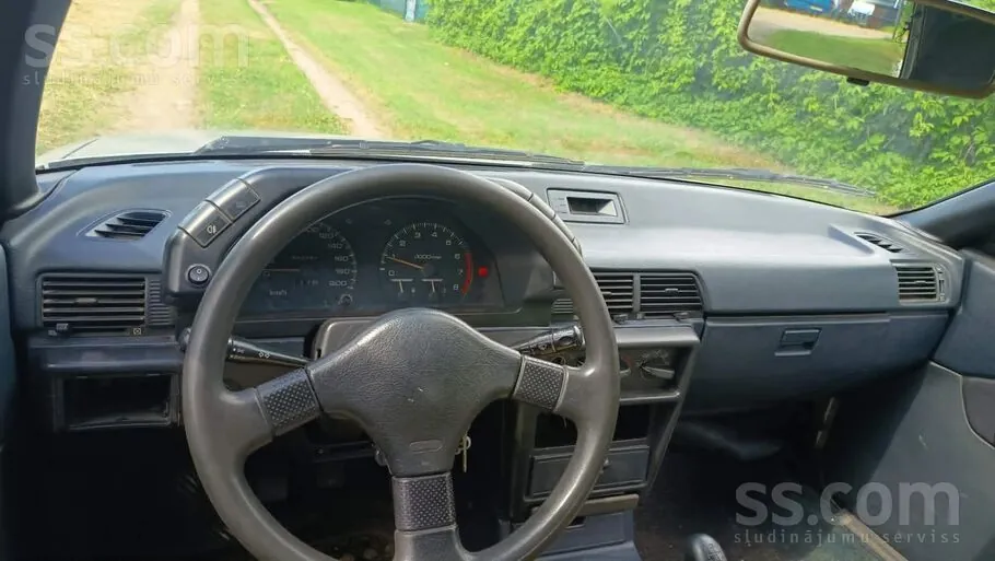 Mitsubishi Colt 1990 photo 5