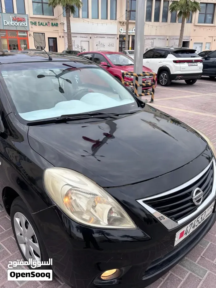 Nissan Sunny 2014 photo 2