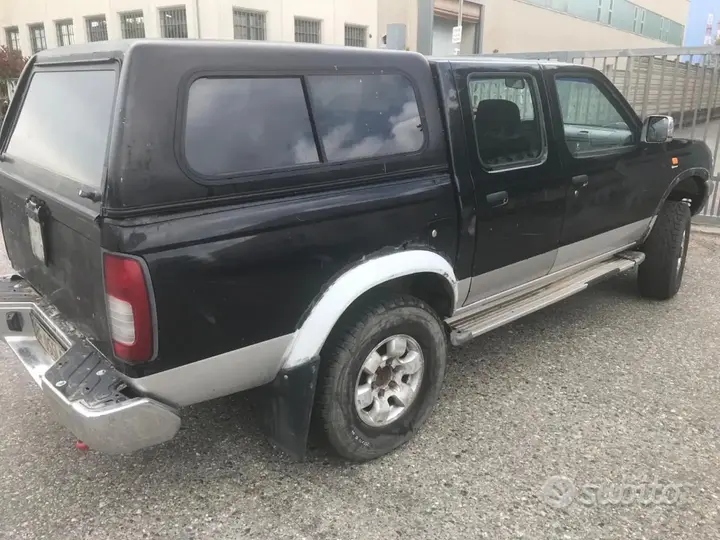 Nissan Navara 1999 photo 2