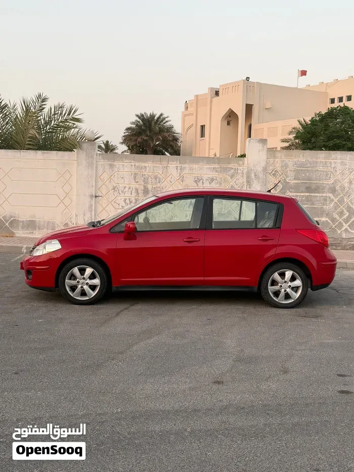 Nissan Tiida 2013 photo 2