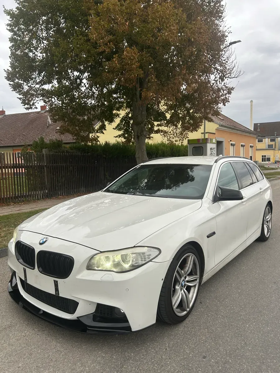 BMW 5 Series 2010 photo 2
