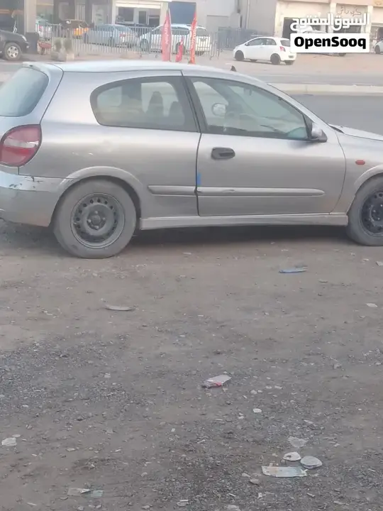 Nissan Almera 2004 photo 3