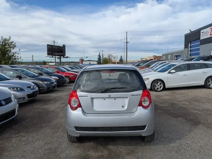 Suzuki Swift 2009 photo 5