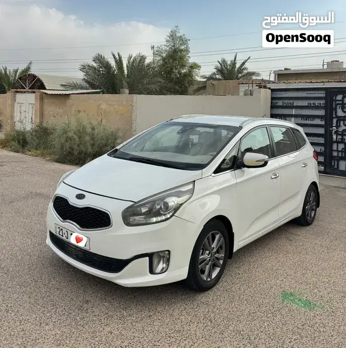 Kia Carens 2014 photo 4