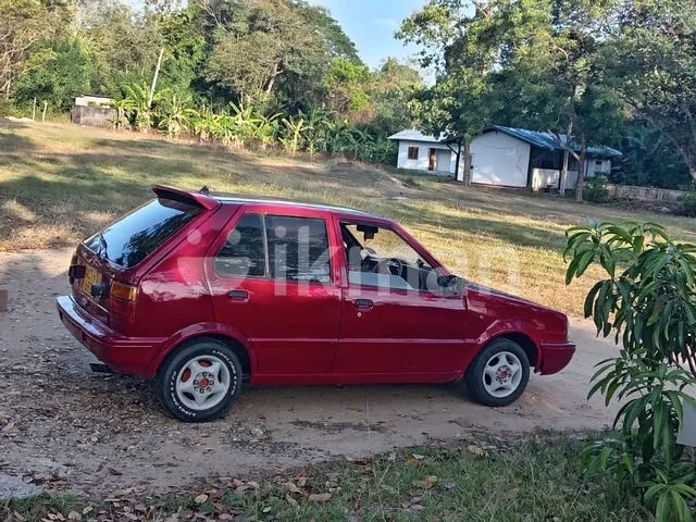 Nissan March 1990 photo 2