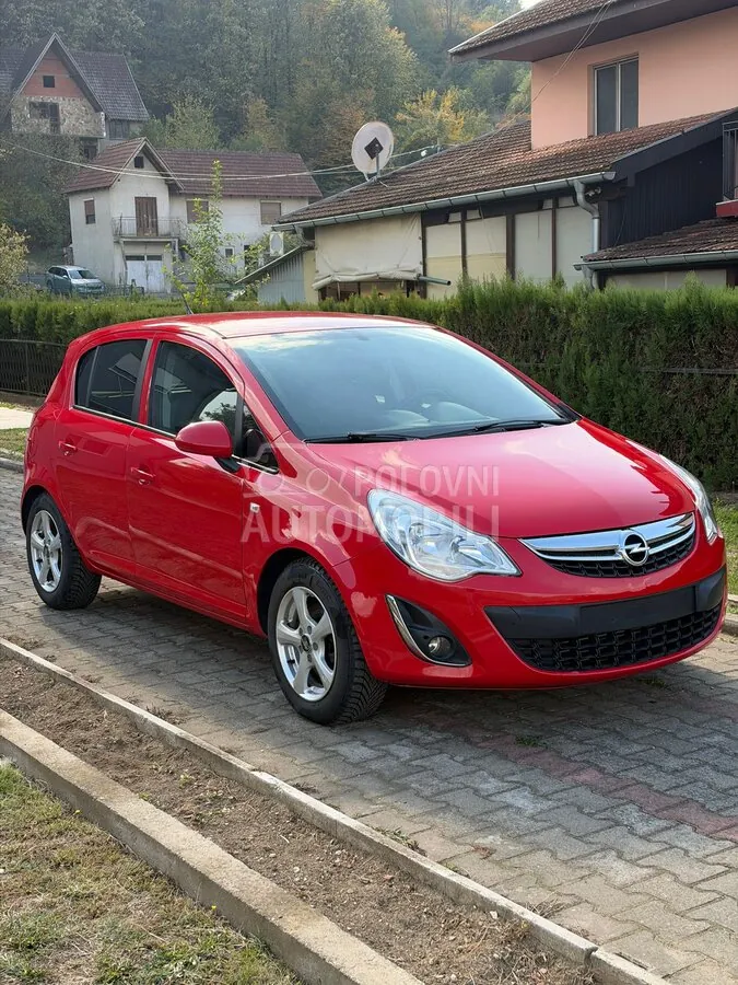 Opel Corsa D 2013 photo 2