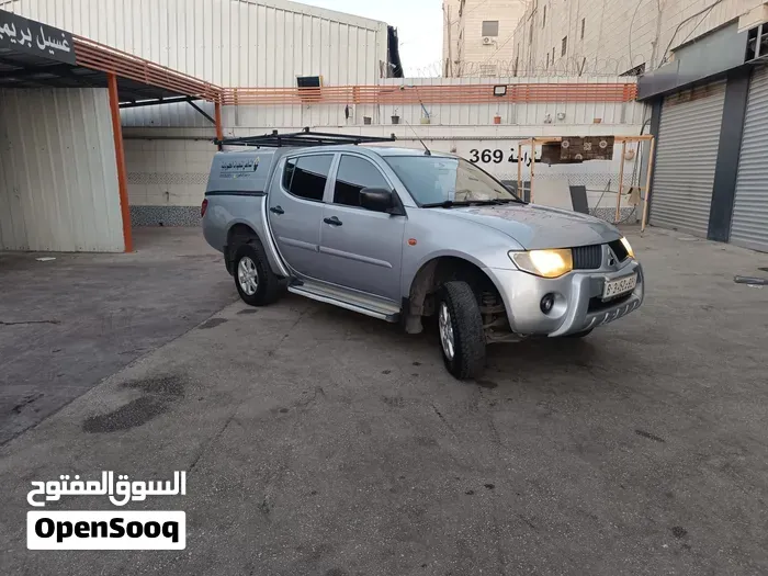 Mitsubishi L200 2009 photo 4