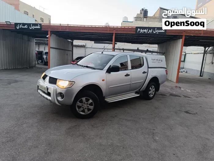 Mitsubishi L200 2009 photo 3