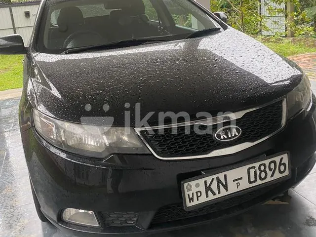 Kia Cerato 2011 photo 2