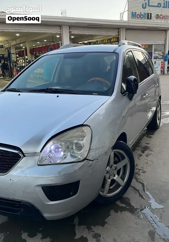 Kia Carens 2011 photo 2