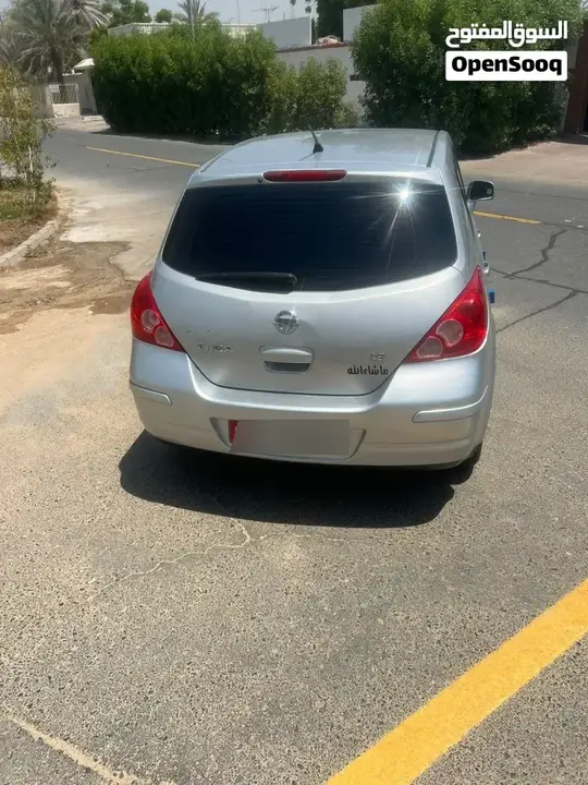 Nissan Tiida 2012 photo 2