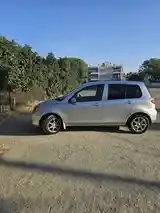 Mazda Demio 2002 photo 4