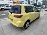 Mazda Demio 2003 photo 2